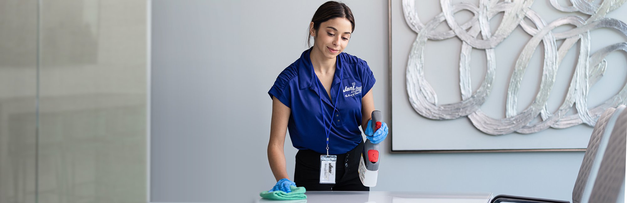a woman in a blue shirt and black pants
