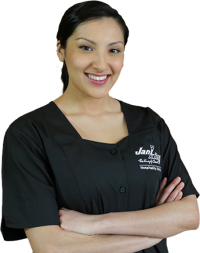 a woman in a black shirt with her arms crossed