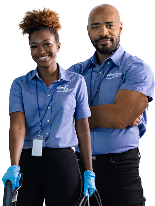 a man and woman wearing blue shirts